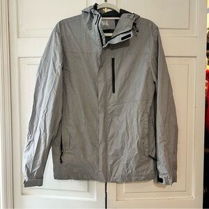 Packable lightweight wind/rain jacket. Unisex small.